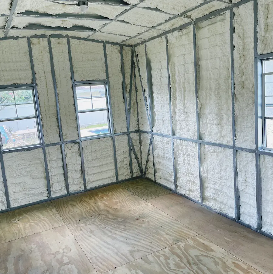 Closed-cell spray foam insulation applied to wall cavities in a residential project in San Bruno